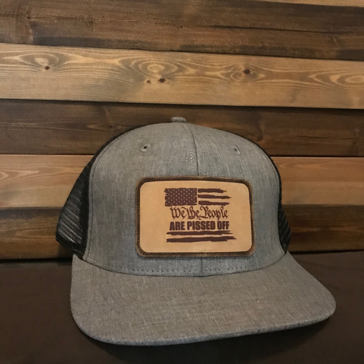 WE THE PEOPLE "ARE PISSED OFF" TRUCKER HAT